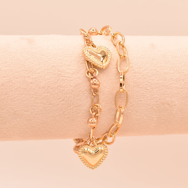 Pulsera Doble con dijes de bolitas y Corazones baño de oro 18K