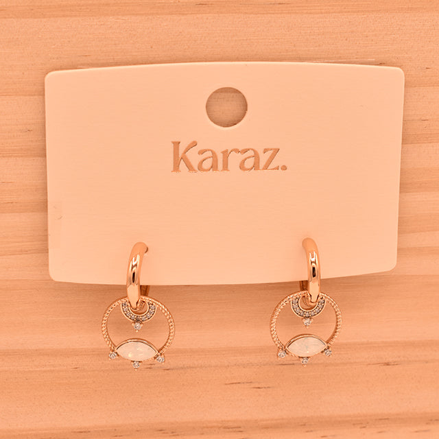 Aretes Karaz: Elegancia Opalina y Brillo Sutil