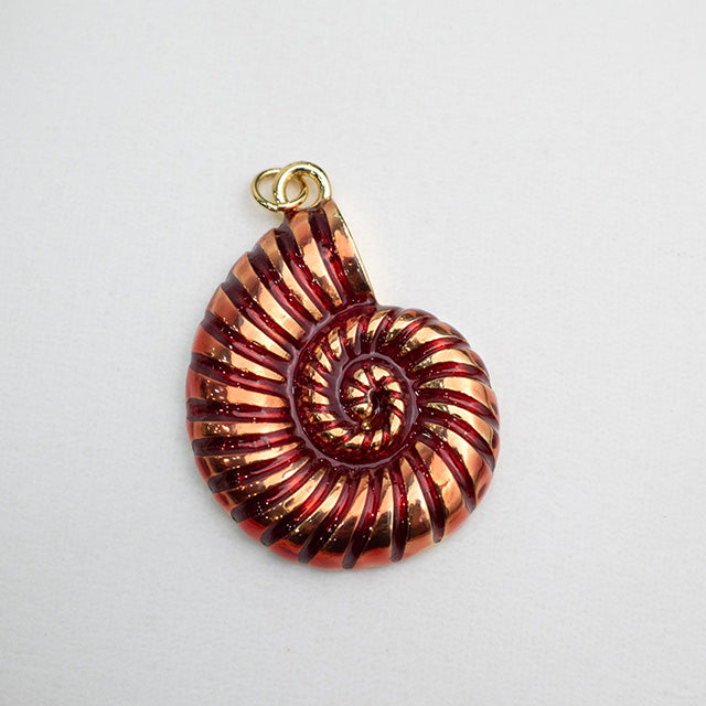 Dije Espiral Nautilus con Detalles en Cobre y Oro