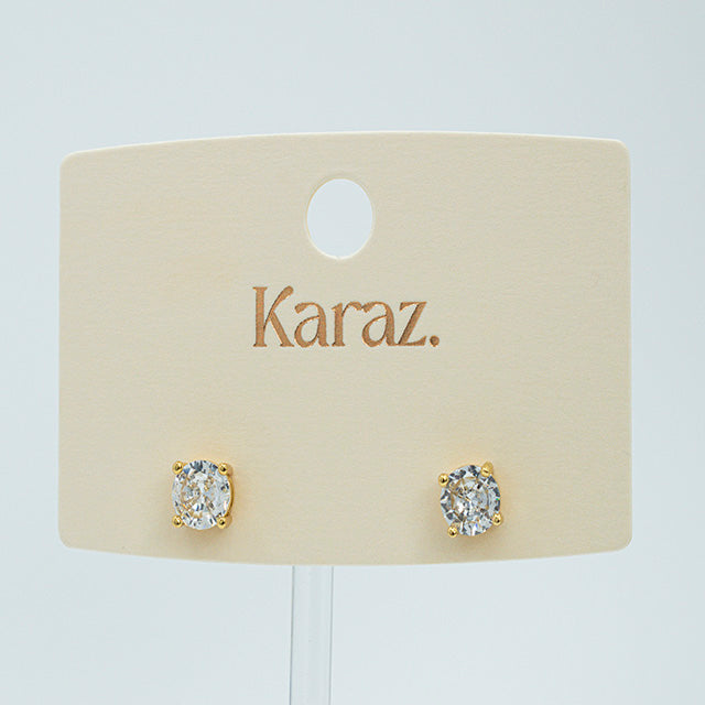 Aretes Topo de Circonia Redonda Laminados en Oro