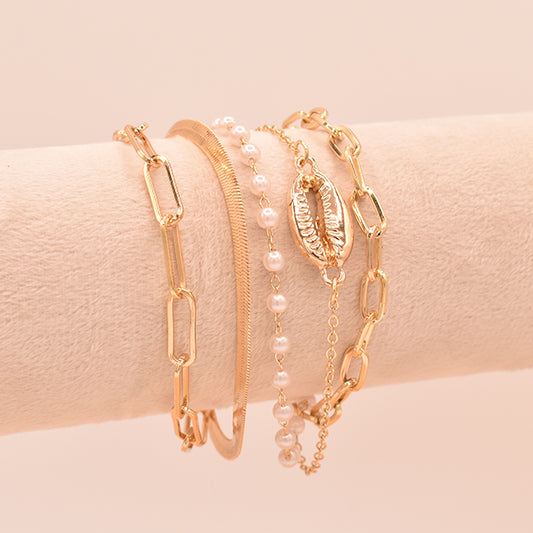 Set de Pulseras Doradas: Paperclip, Perlas y Concha Marina