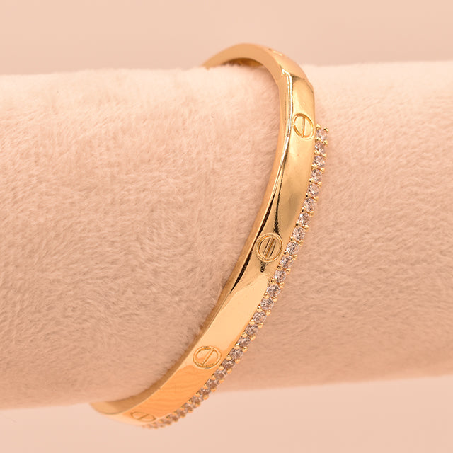 Pulsera Rígida Dorada con Circonitas