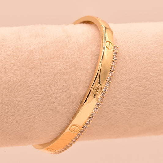 Pulsera Rígida Dorada con Circonitas