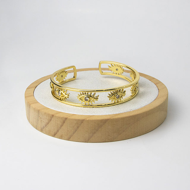 Pulsera Cuff Ojos Protectores Dorada