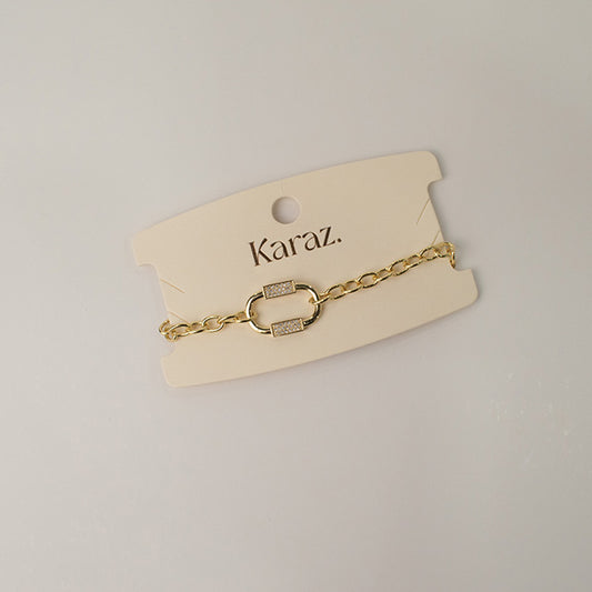 Pulsera Clip Dorada con Circonitas Brillantes