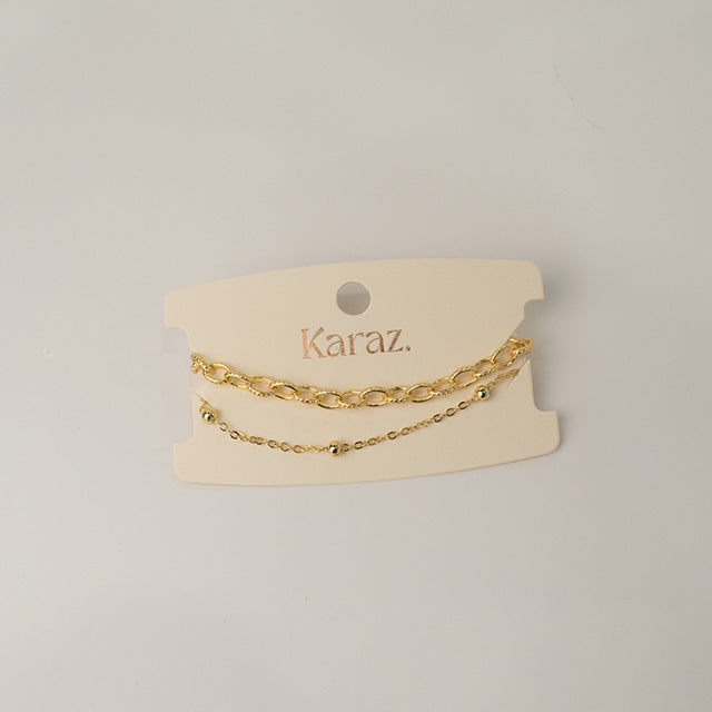 Pulsera Doble de Cadenas en Oro
