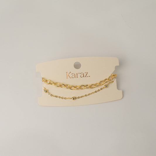 Pulsera Doble de Cadenas en Oro