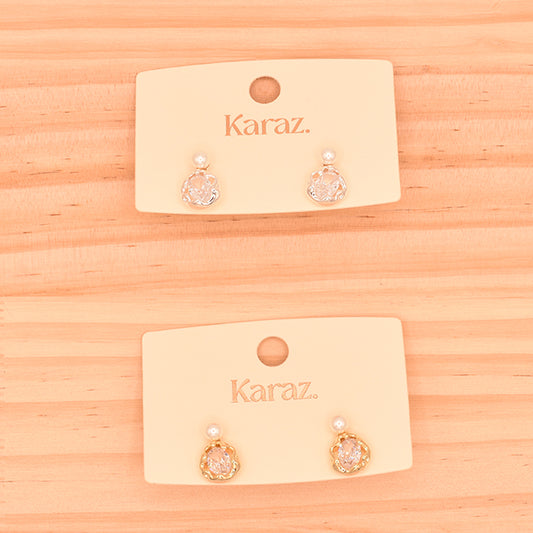 Aretes Elegantes con Perla y Diseño Floral
