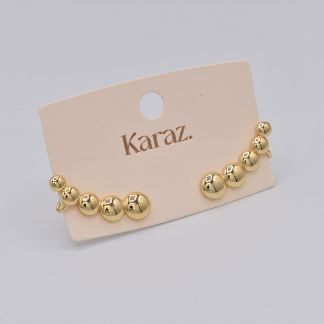 Aretes Trepadores de Bolas Doradas