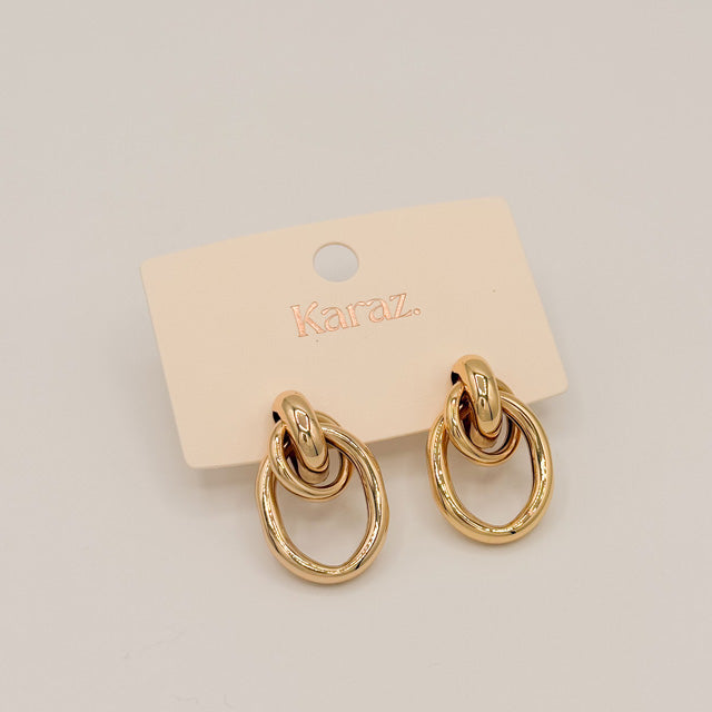 Aretes Eslabones Dorados Elegancia Moderna