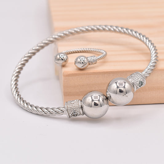Pulsera Rígida Trenzada con Esferas Pulidas