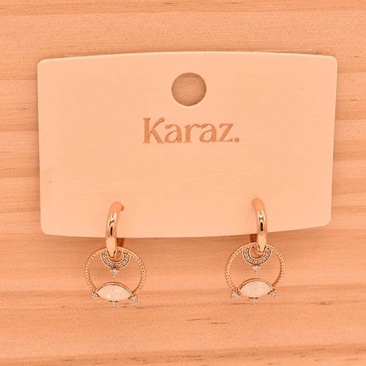 Aretes Karaz: Elegancia Opalina y Brillo Sutil