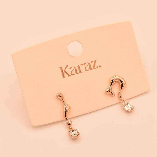 Pendientes Fluidos Asimétricos con Cristal