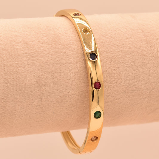 Pulsera Rígida Dorada con Piedras de Colores