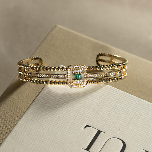 Pulsera Rígida Esmeralda y Circonitas Dorada