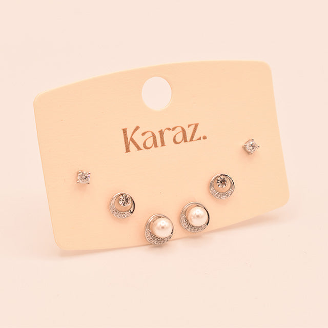 Set de Pendientes Topo Plateados: Elegancia Versátil para Cada Ocasión