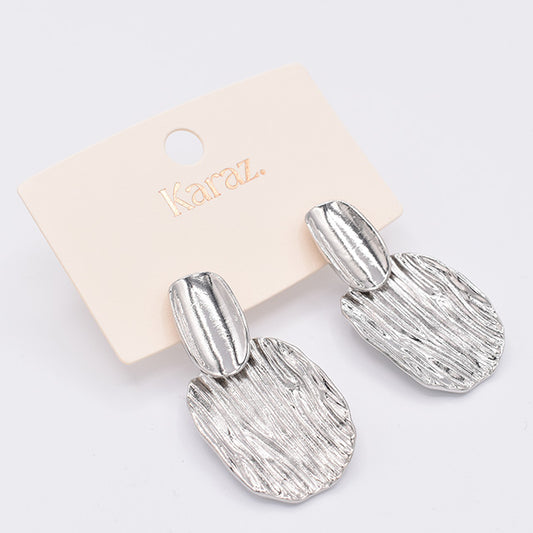Aretes Colgantes Plateados con Textura Orgánica