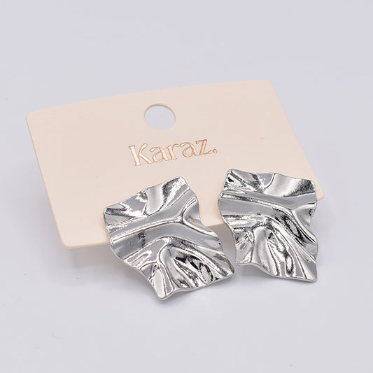 Aretes Plateados Ondulados | Diseño Escultural