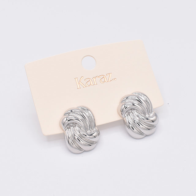 Aretes Plateados Nudo Texturizado Karaz