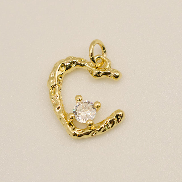 Dije Corazón Dorado Texturizado con Circonita
