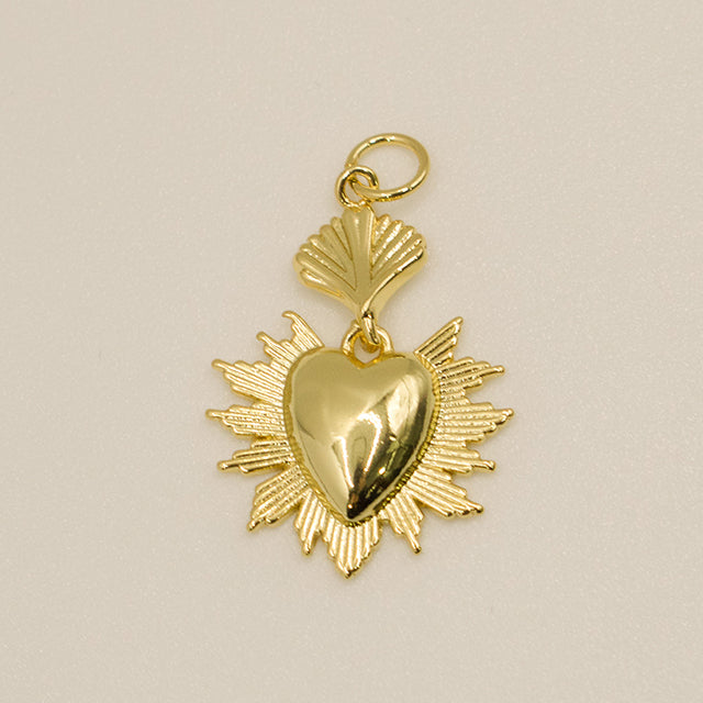Dije Corazón Radiante Dorado con Rayos