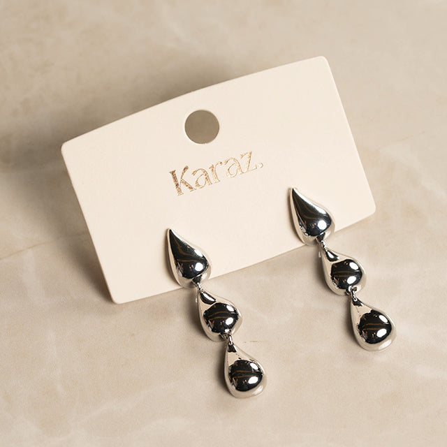 Pendientes Gotas de Brillo Plateado