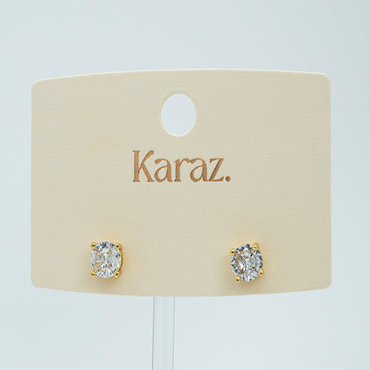 Aretes Topo de Circonia Redonda Laminados en Oro