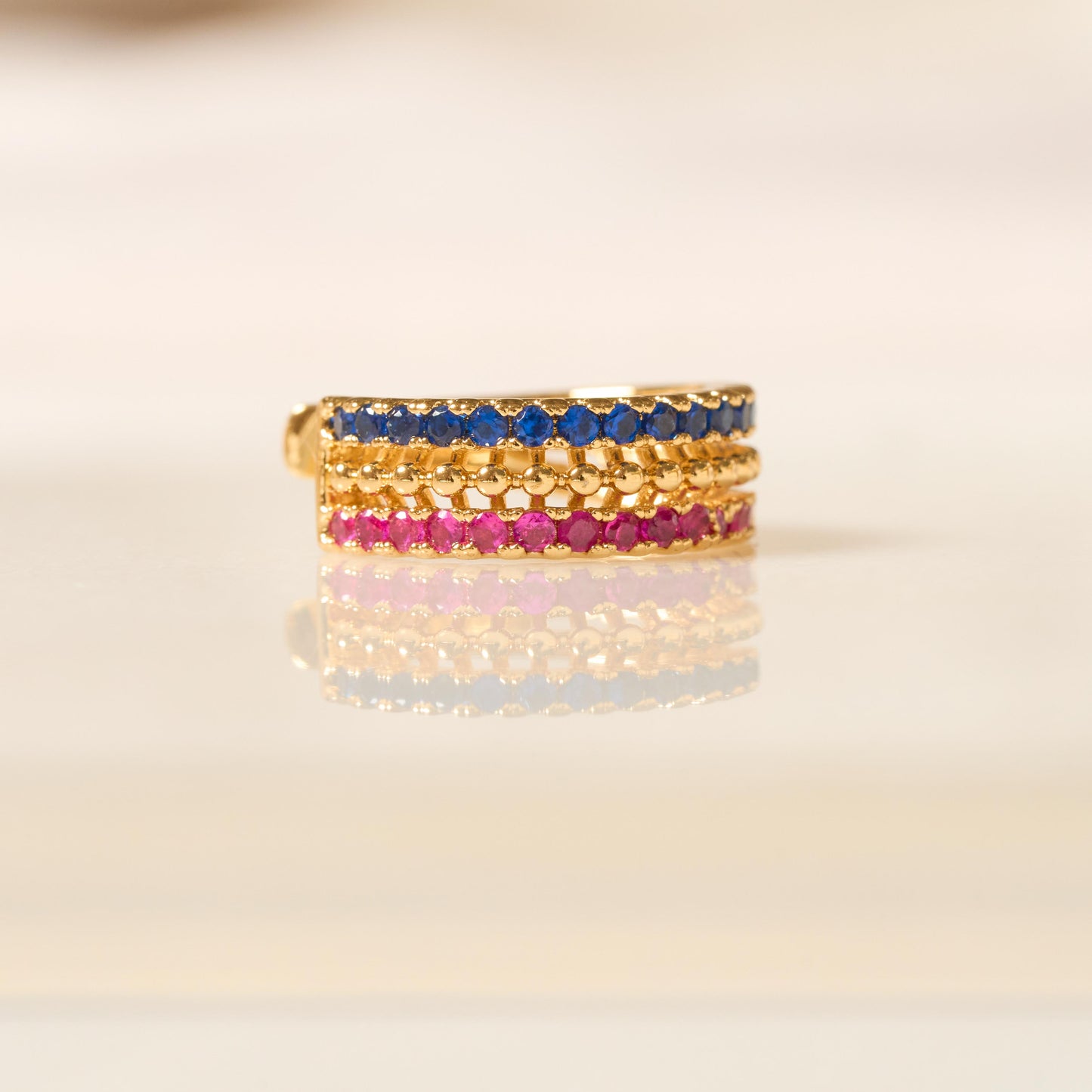 Earcuff Triple Banda Oro Laminado con Zirconias Azules y Rosas