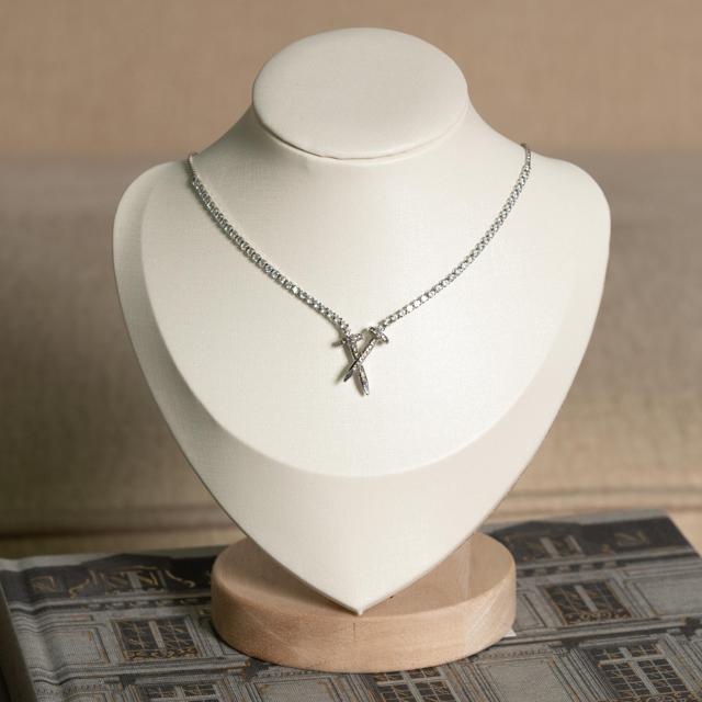 Collar Clavo Cruzado de Plata